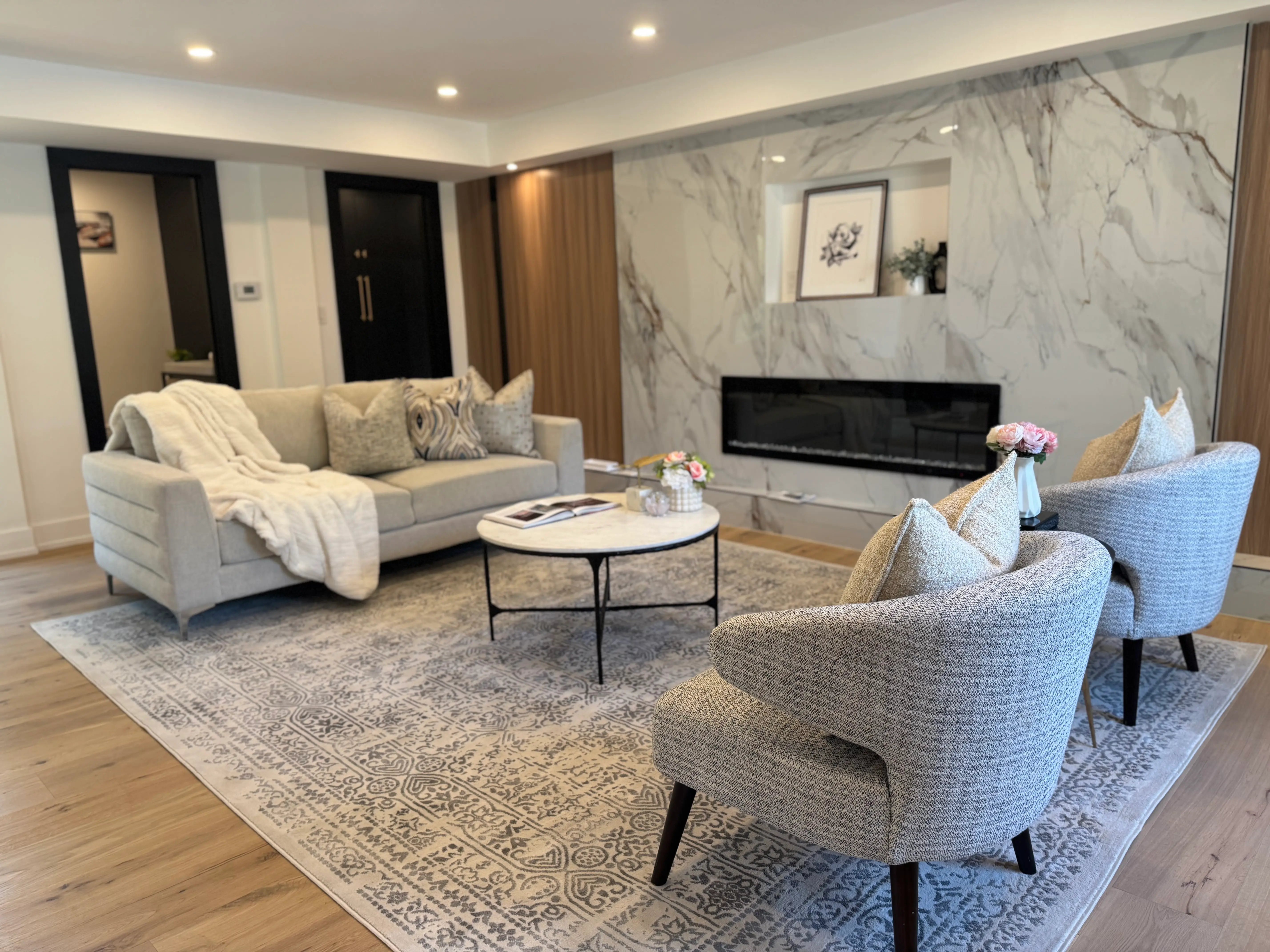Staged bedroom with neutral tones in Toronto house